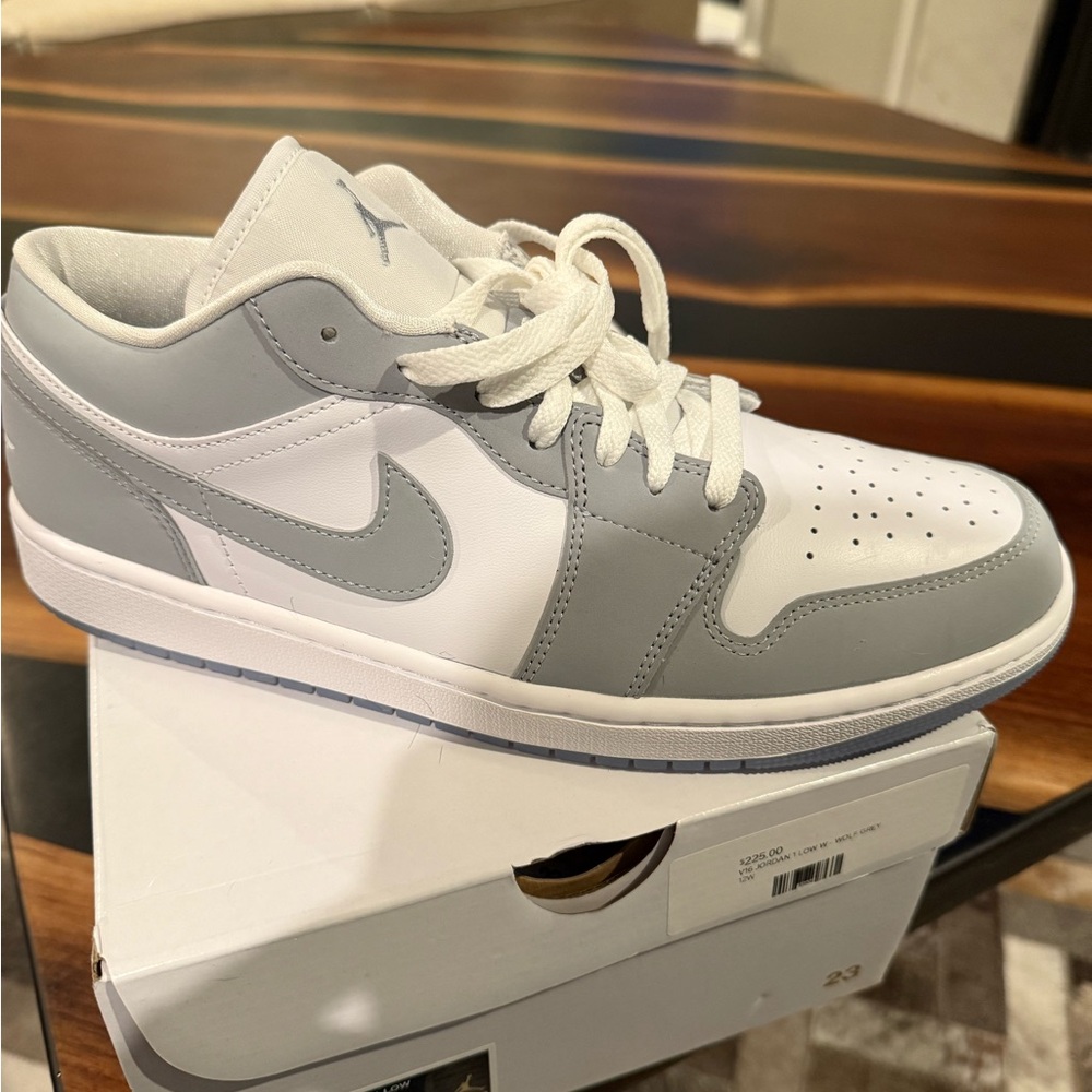 New, never worn jordans. White and wolf grey. Size 11.
